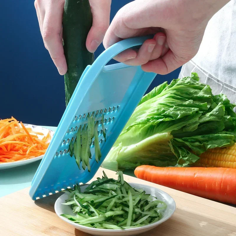 Hand-Held Vegetable Grater and Slicer with Container