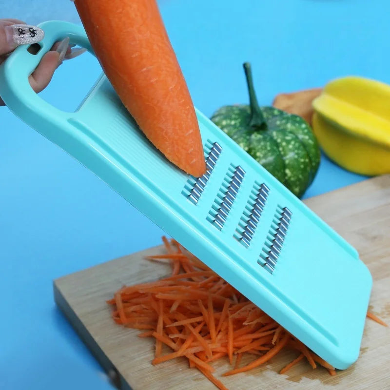 Hand-Held Vegetable Grater and Slicer with Container