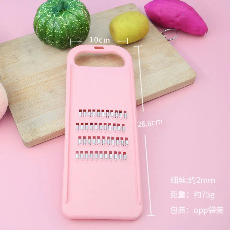 Hand-Held Vegetable Grater and Slicer with Container