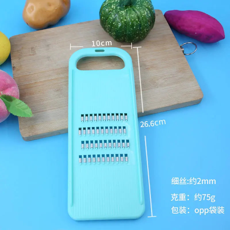 Hand-Held Vegetable Grater and Slicer with Container